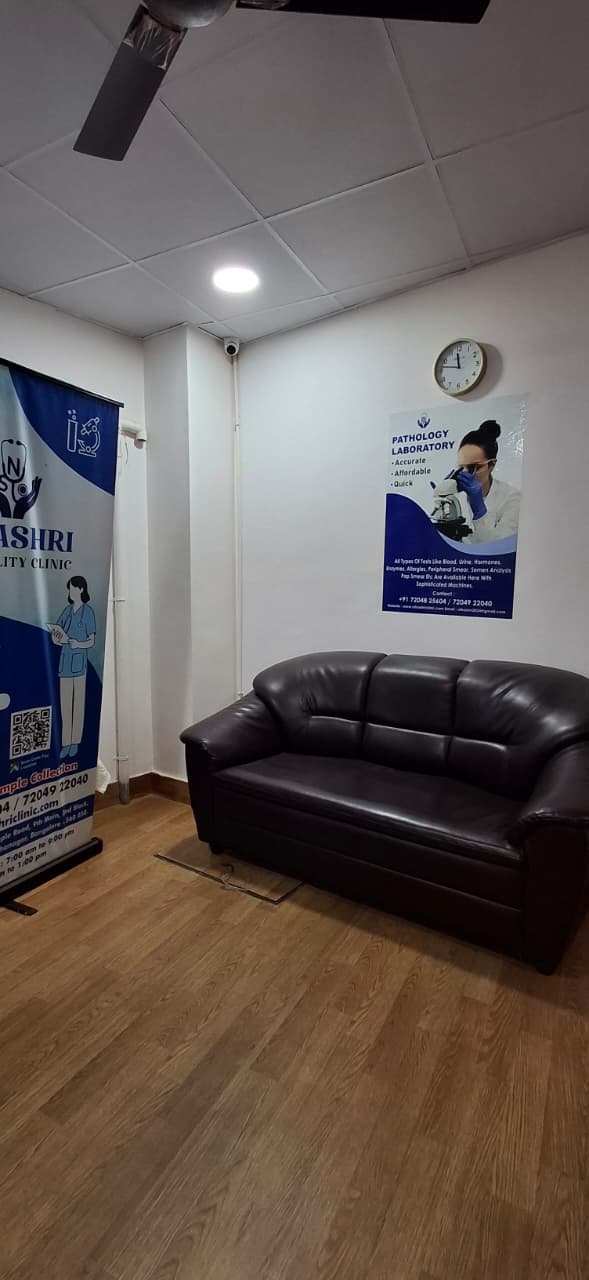 Comfortable waiting lounge with sofa at Nihashri Clinic